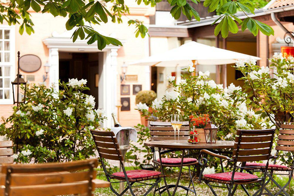 Althoff Hotel Fuerstenhof سيل المظهر الخارجي الصورة The garden of the hotel